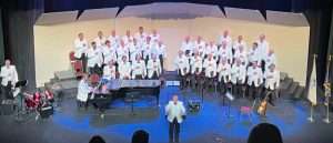roland williams at the piano with master singers